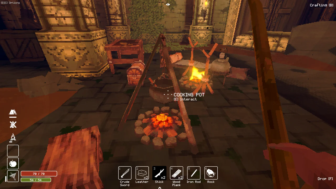 A cooking pot over coals in a dungeon campsite, beside a chest and workstations.